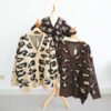 74a1d918-863d-4a95-87b0-25393d5e4d5a-1.jpg ByMeldev Leopard Motif Premium Cardigan Tebal Musim Dingin